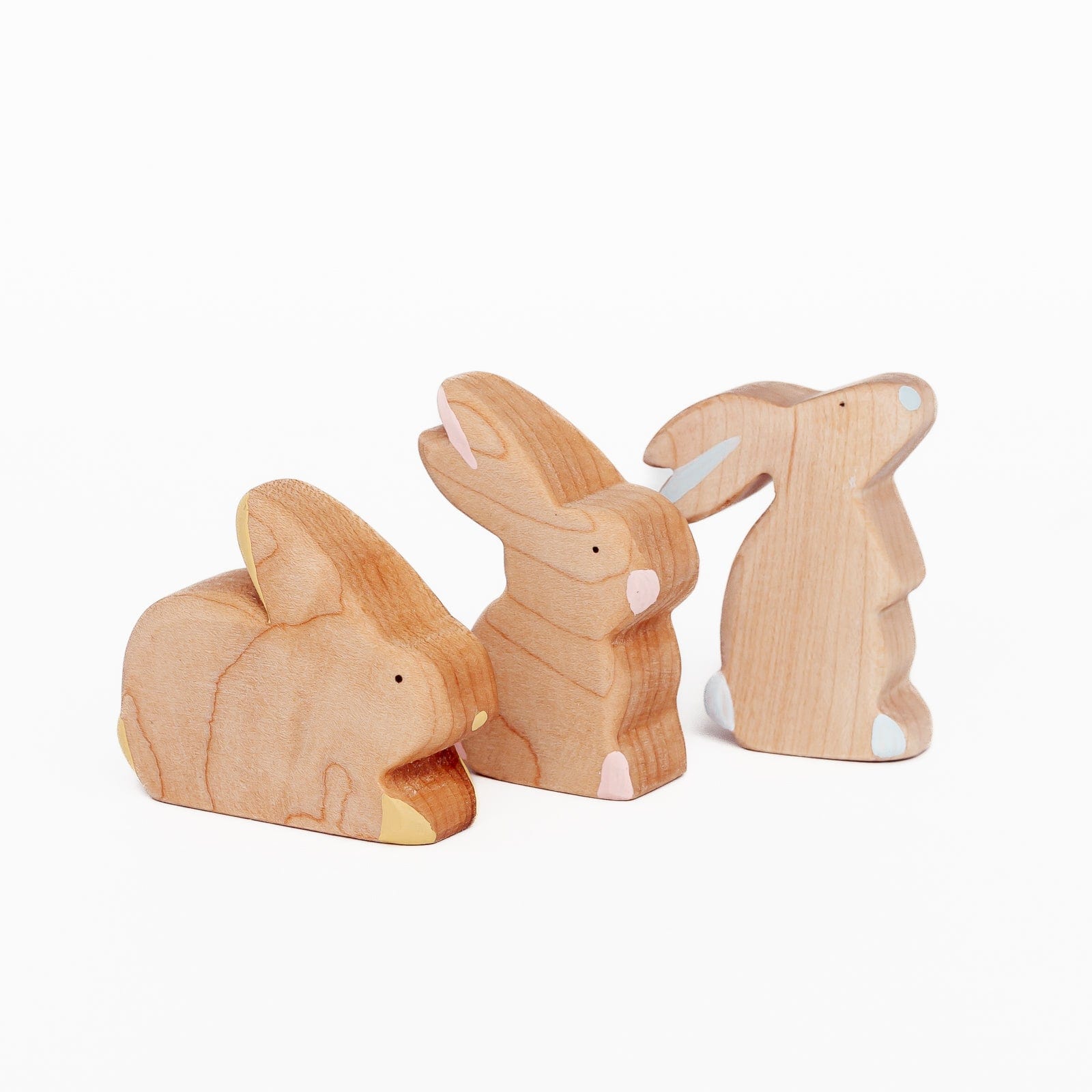 http://www.theplayfulpeacock.com/cdn/shop/products/the-wooden-kind-family-of-bunnies-handmade-in-canada-wooden-animals-36850086478078.jpg?v=1679706557