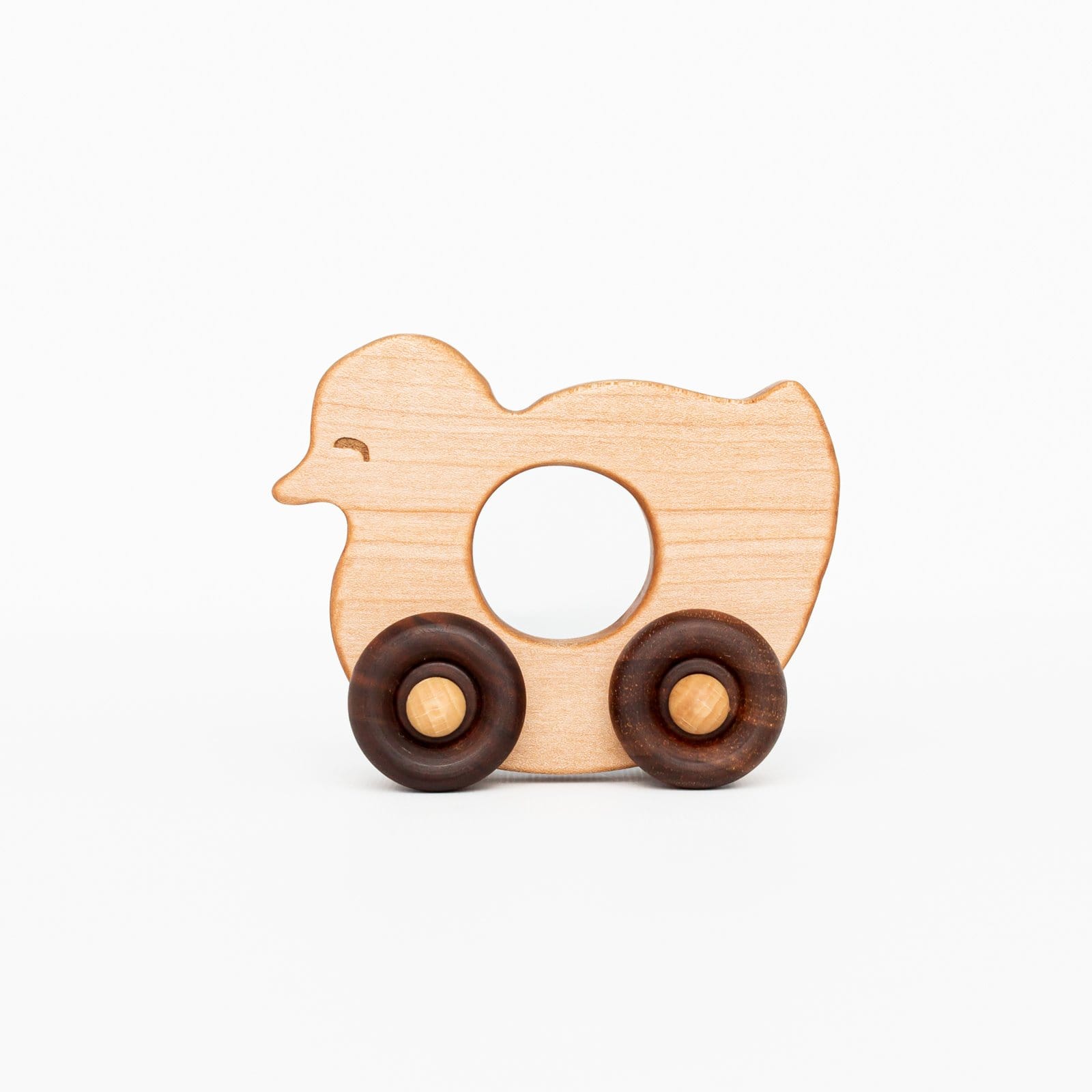 http://www.theplayfulpeacock.com/cdn/shop/products/wooden-story-handmade-baby-duck-toy-things-that-go-34593233273086.jpg?v=1637025263